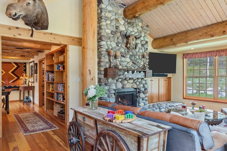 Rustic living room with fireplace.