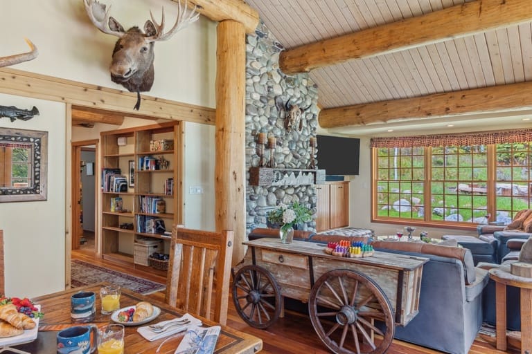 Rustic living room with wooden beams.