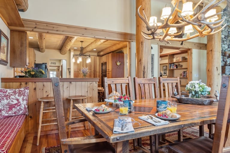 Rustic dining room with wooden furniture.