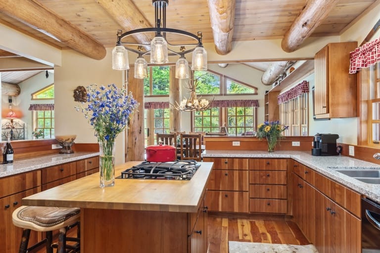 Rustic kitchen with wooden beams.