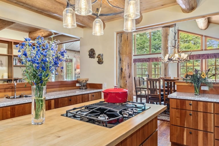 Rustic kitchen with wooden beams.