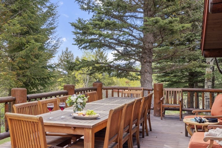 Outdoor deck with dining table.