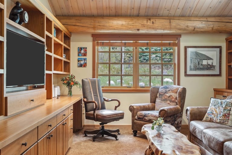 Cozy rustic living room with furniture.