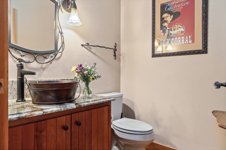 Rustic bathroom with western decor.