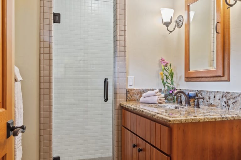Bathroom with shower and vanity.