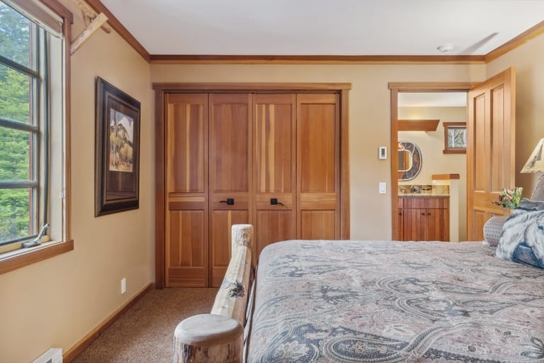 Cozy bedroom with wooden furniture.