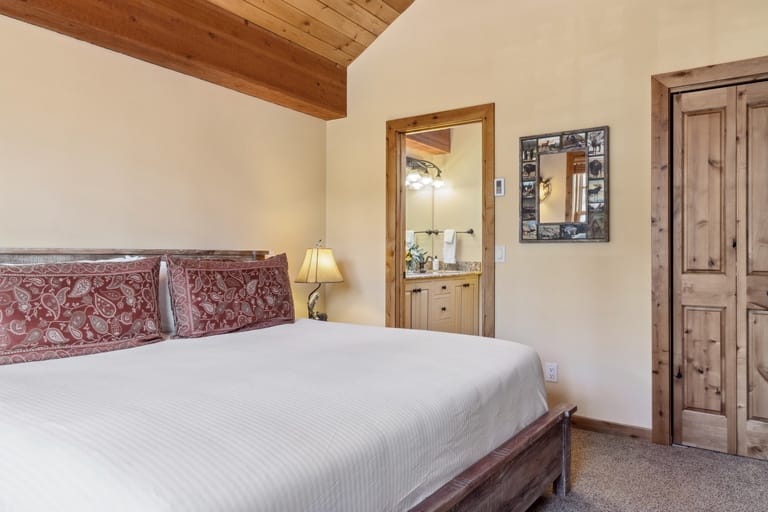 Cozy bedroom with wooden accents.
