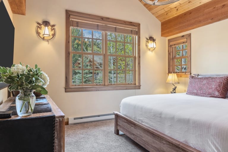 Cozy bedroom with wooden accents.