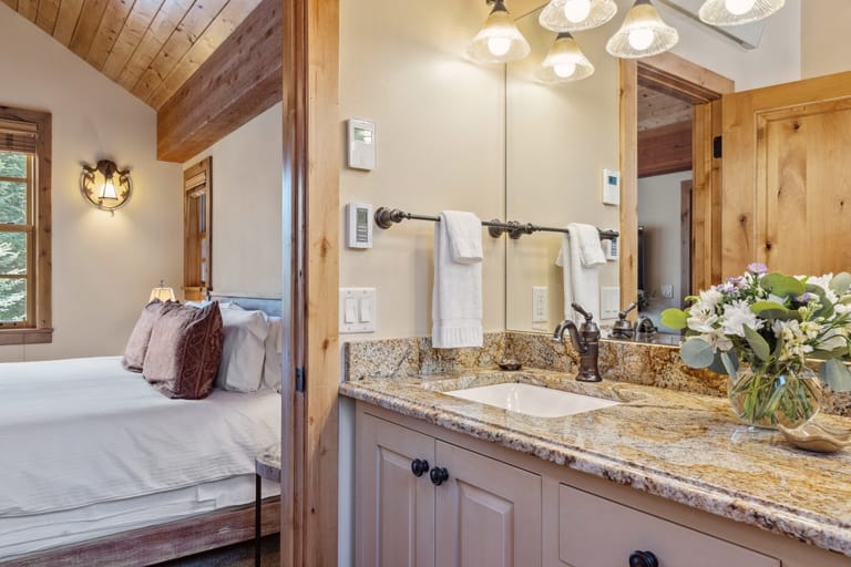 Cozy bedroom and bathroom vanity.