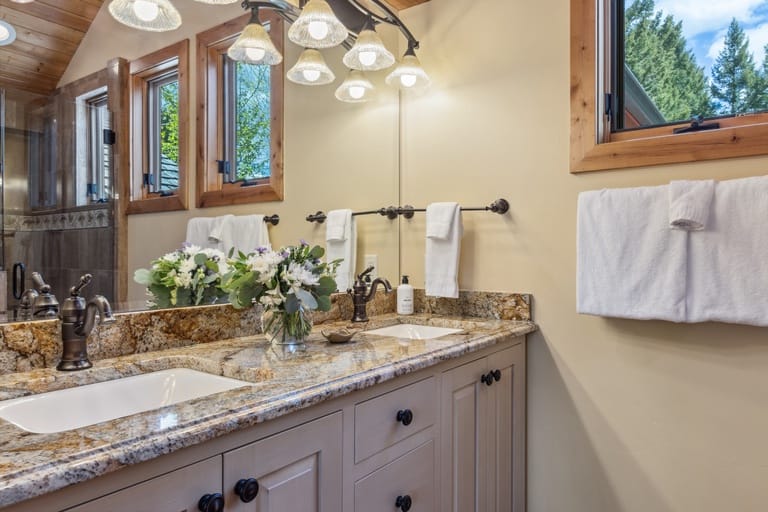 Cozy bathroom with double sinks.
