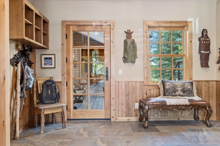 Rustic entryway with wooden decor.