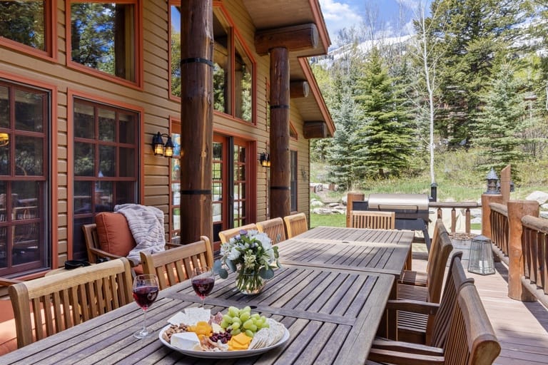 Outdoor dining table with food.