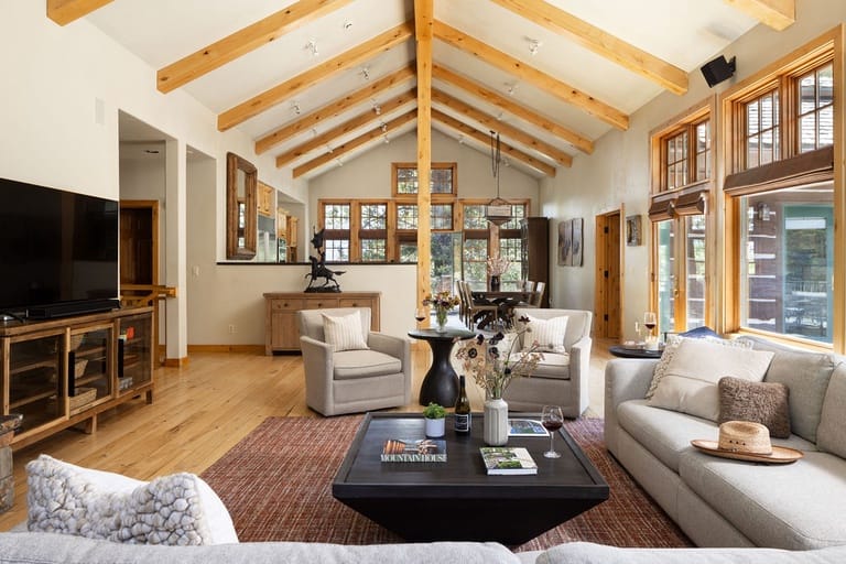 Spacious living room with vaulted ceiling.