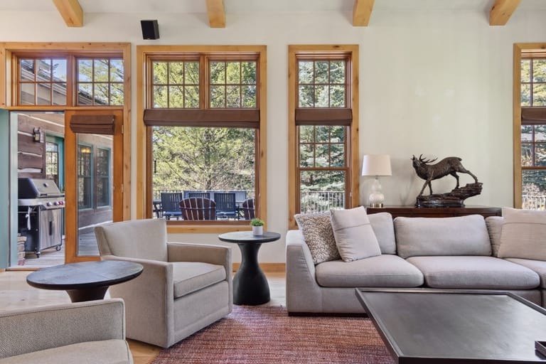 Cozy living room with large windows.