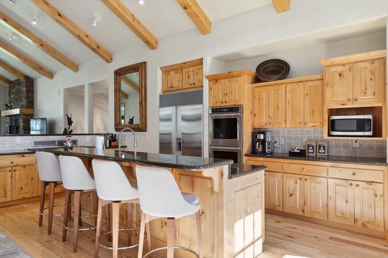 Modern kitchen with wooden cabinets.