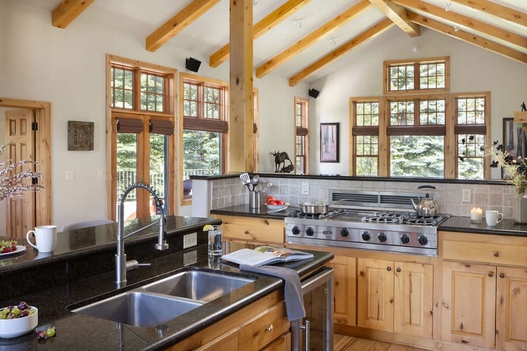 Spacious kitchen with wooden cabinets.