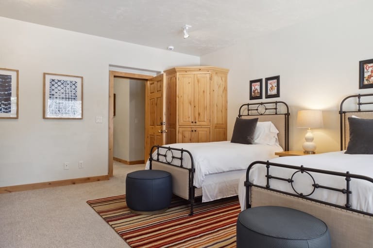 Cozy bedroom with two beds.