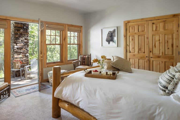 Cozy bedroom with outdoor view.