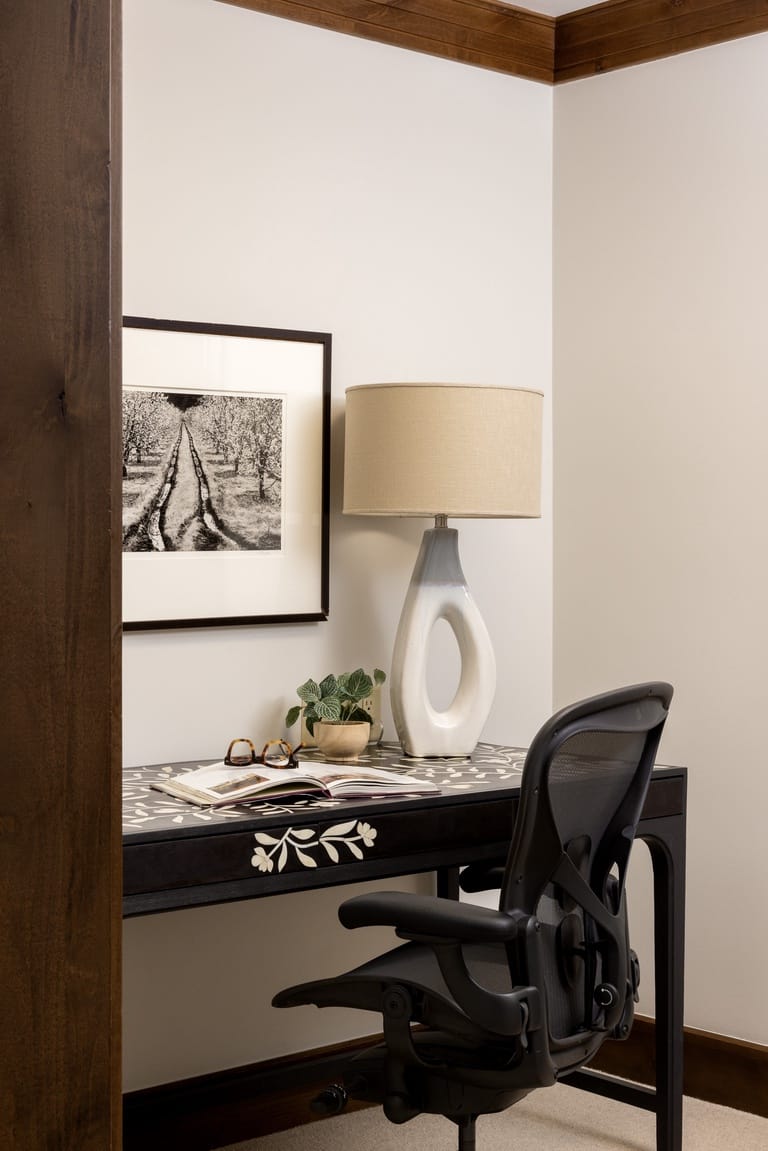 Cozy home office with lamp.