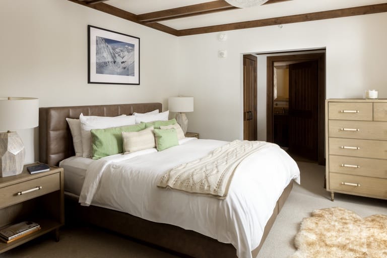 Cozy bedroom with wooden accents.