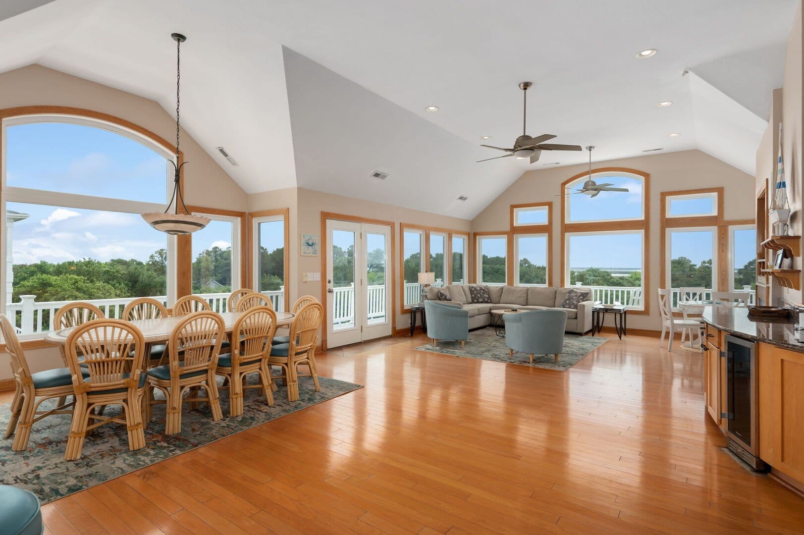 Spacious living room, large windows.
