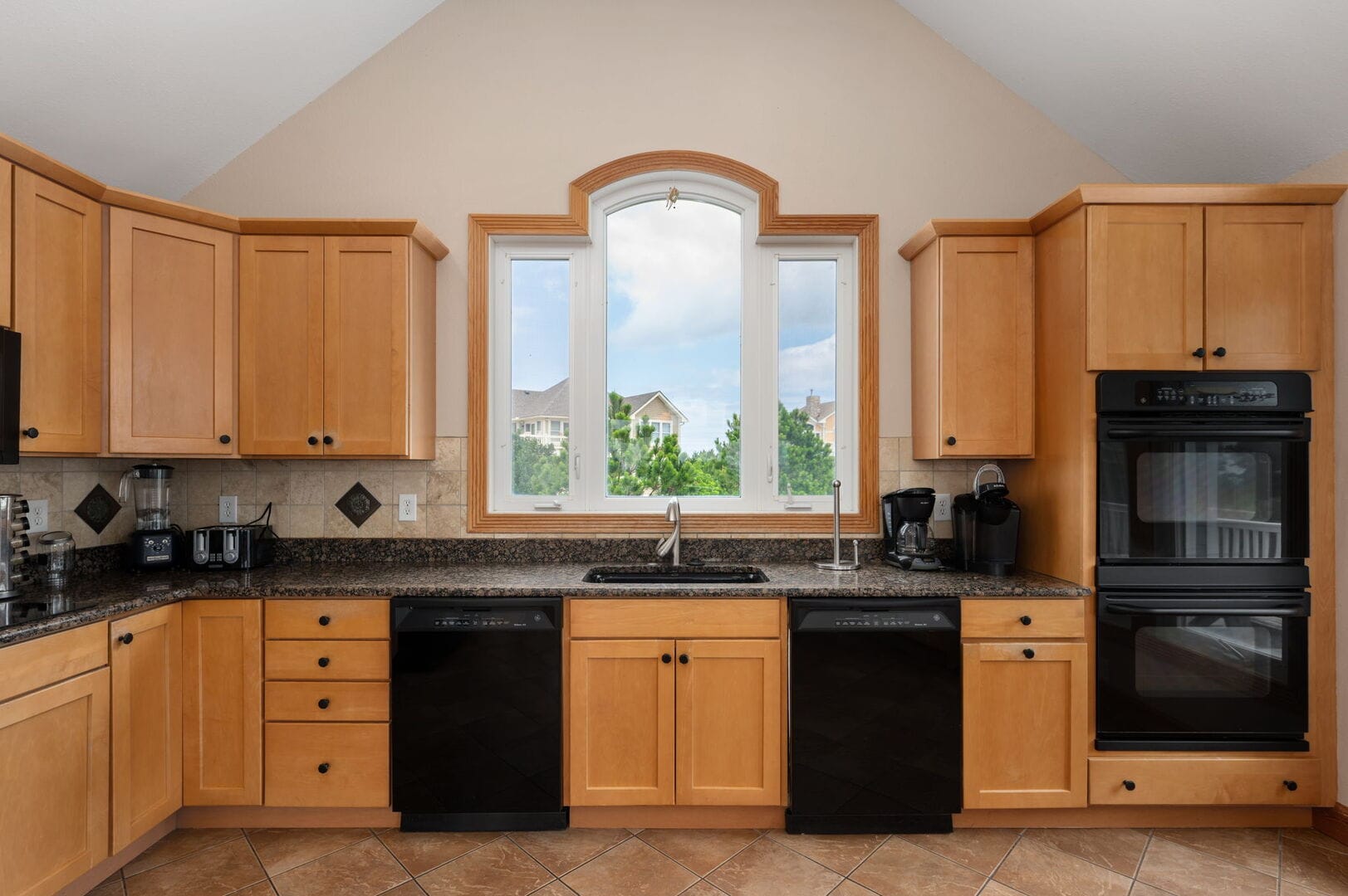 Modern kitchen with wooden cabinets.