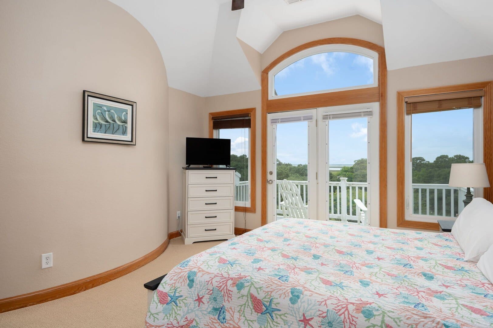 Bedroom with window and dresser.
