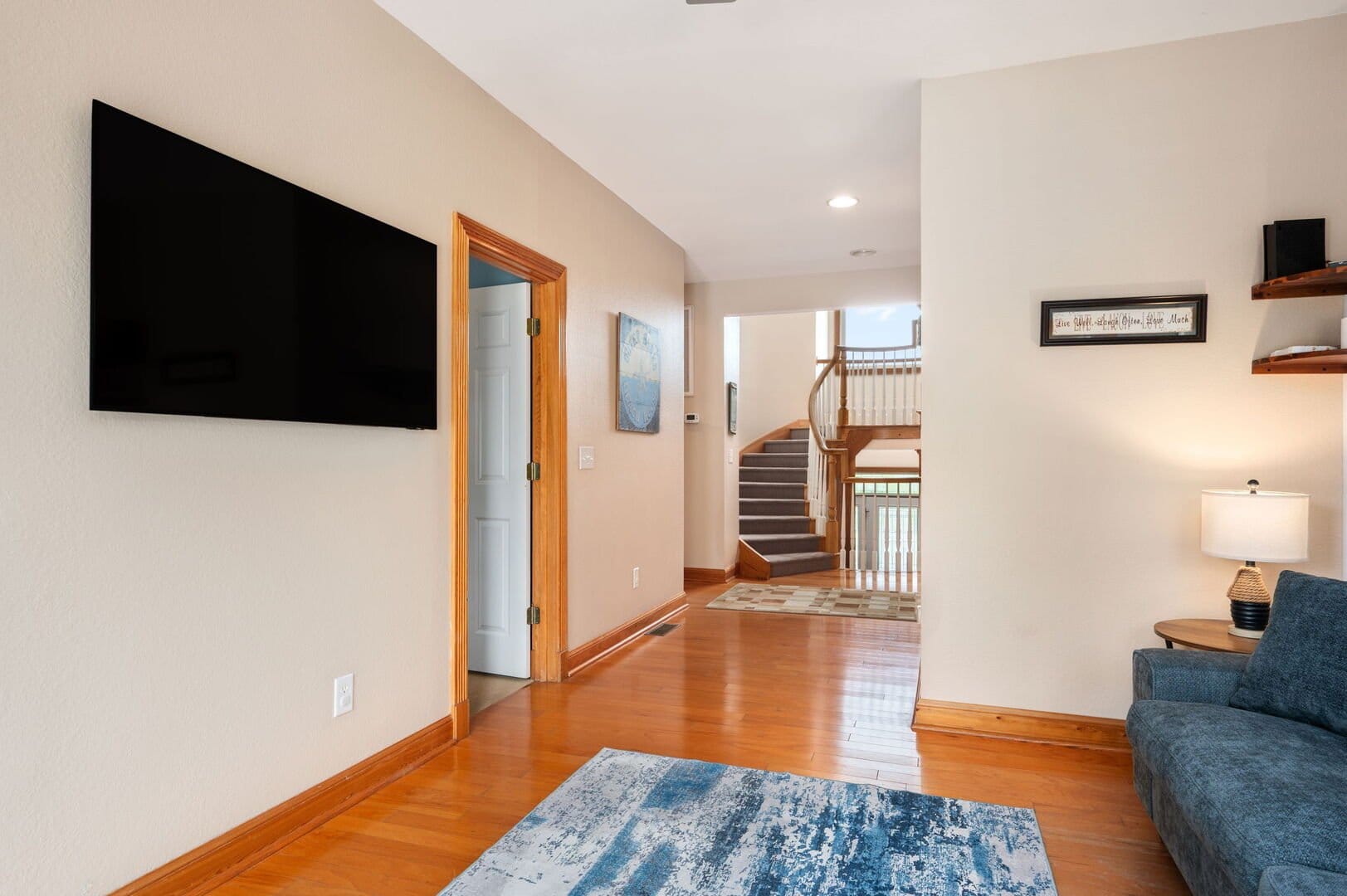 Living room with staircase view.