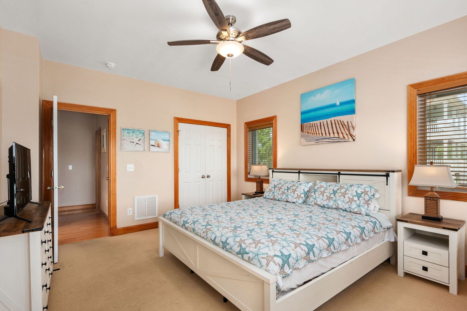 Cozy bedroom with beach decor.