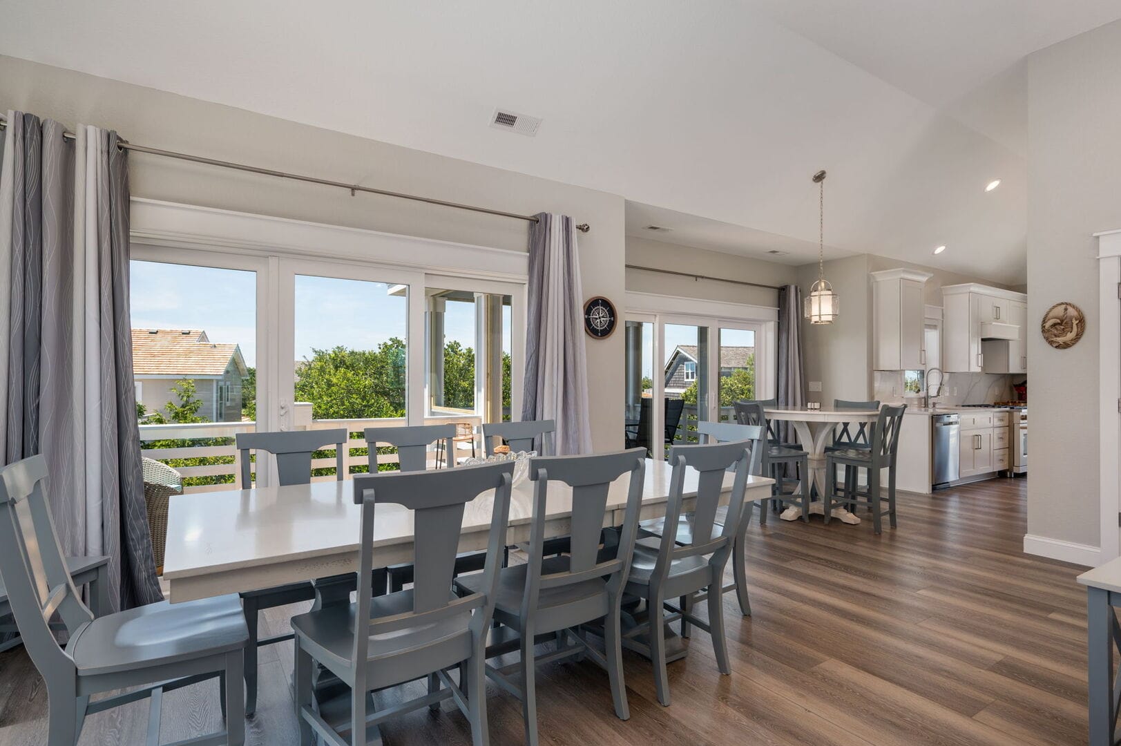 Bright dining area with large windows.