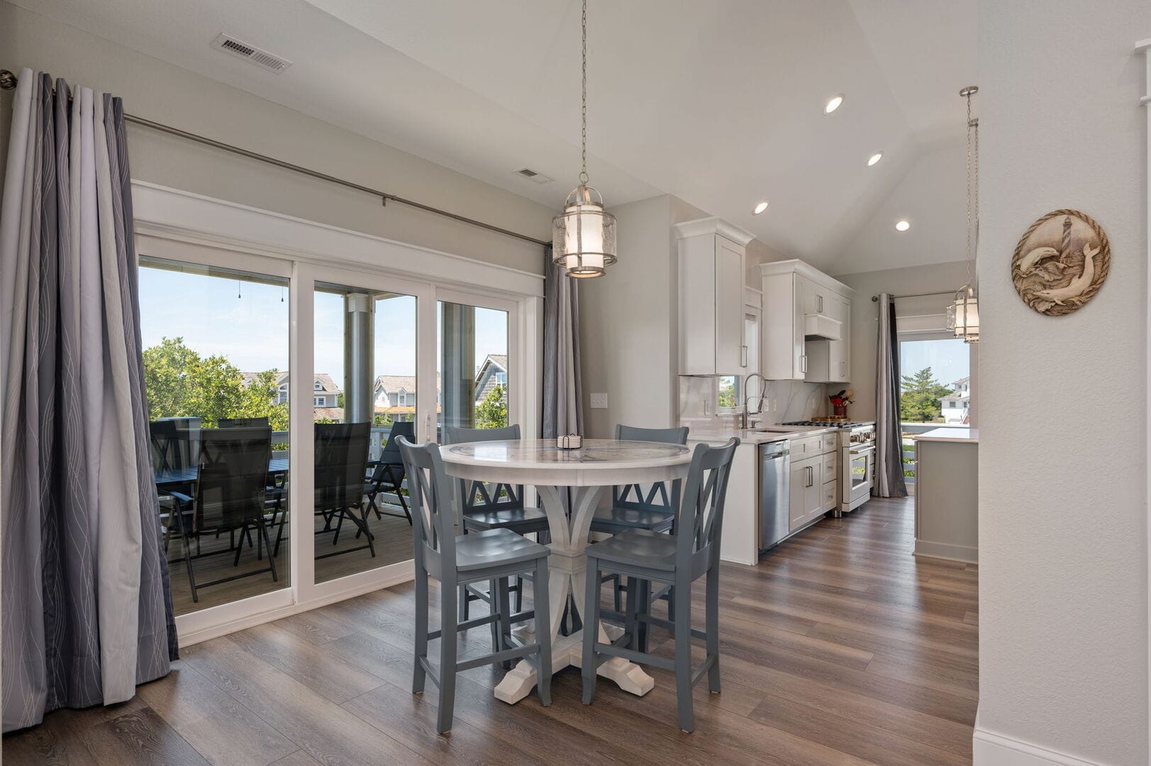 Modern kitchen with round dining table.