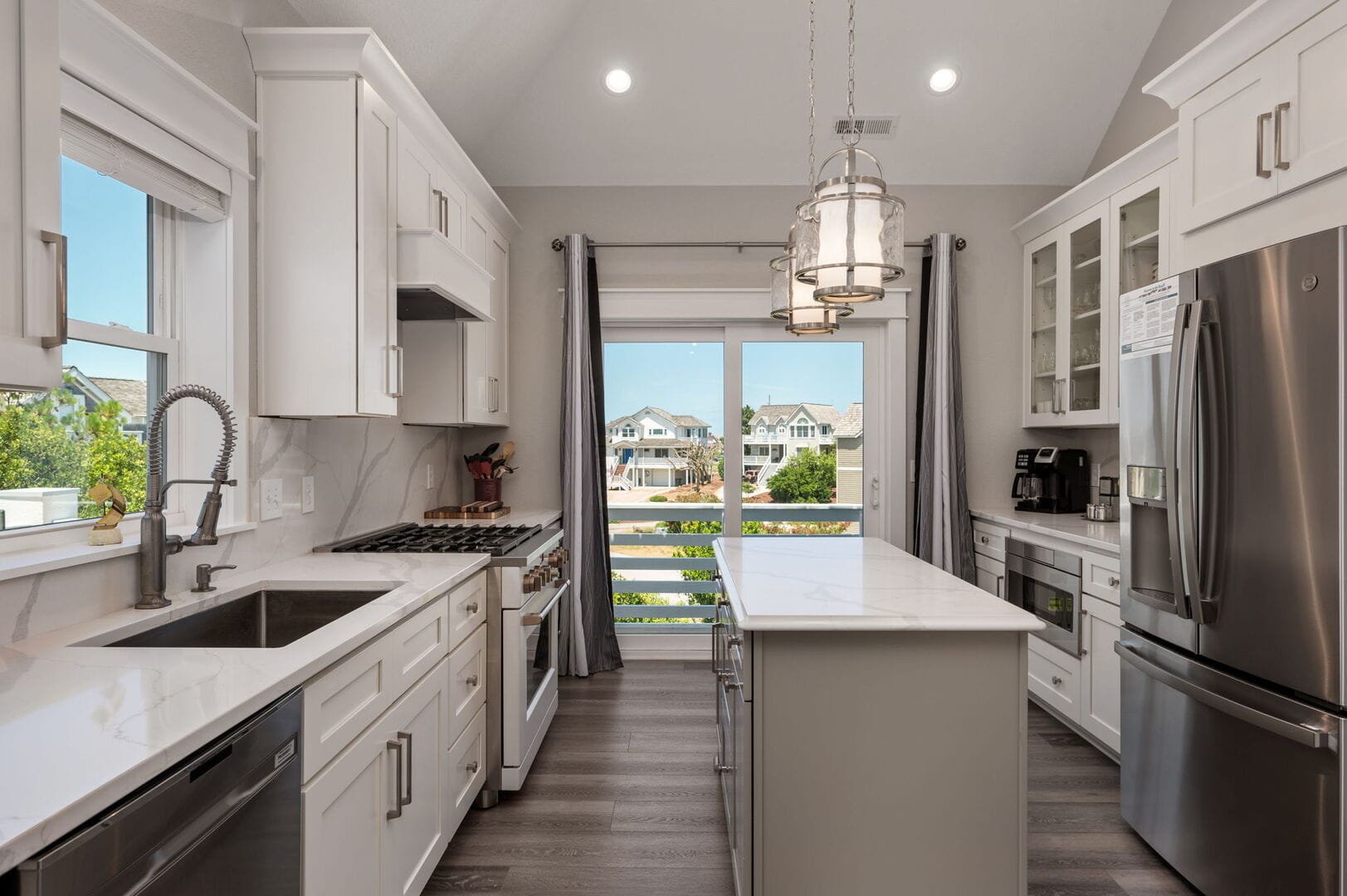 Modern kitchen with large windows.