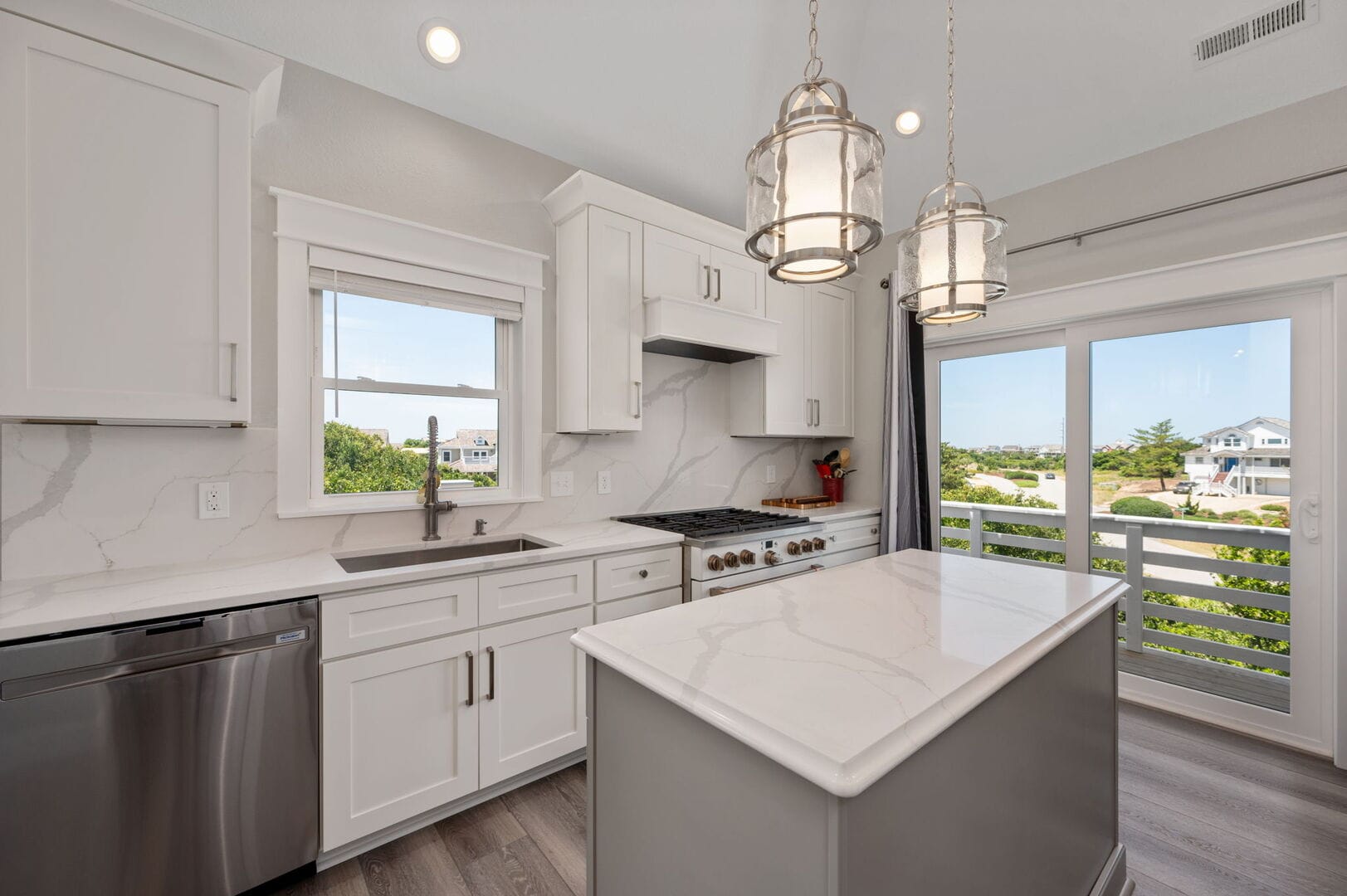 Modern kitchen with large windows.