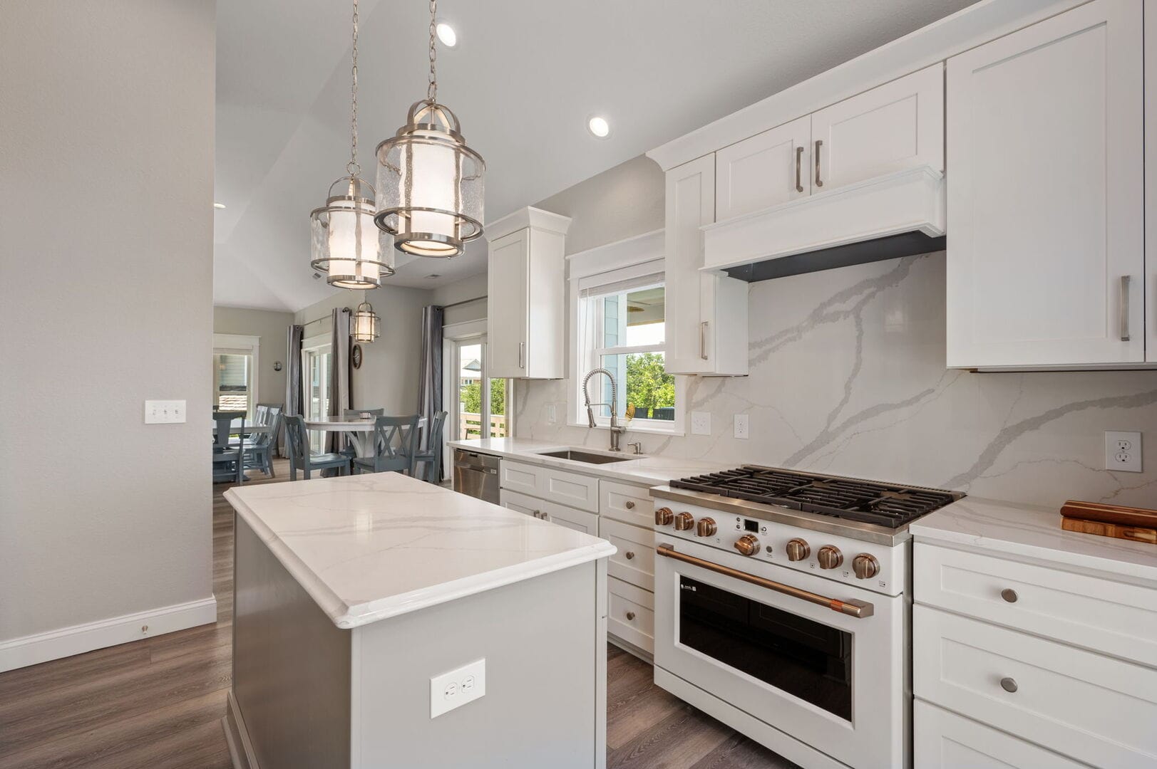Modern kitchen with white cabinetry.