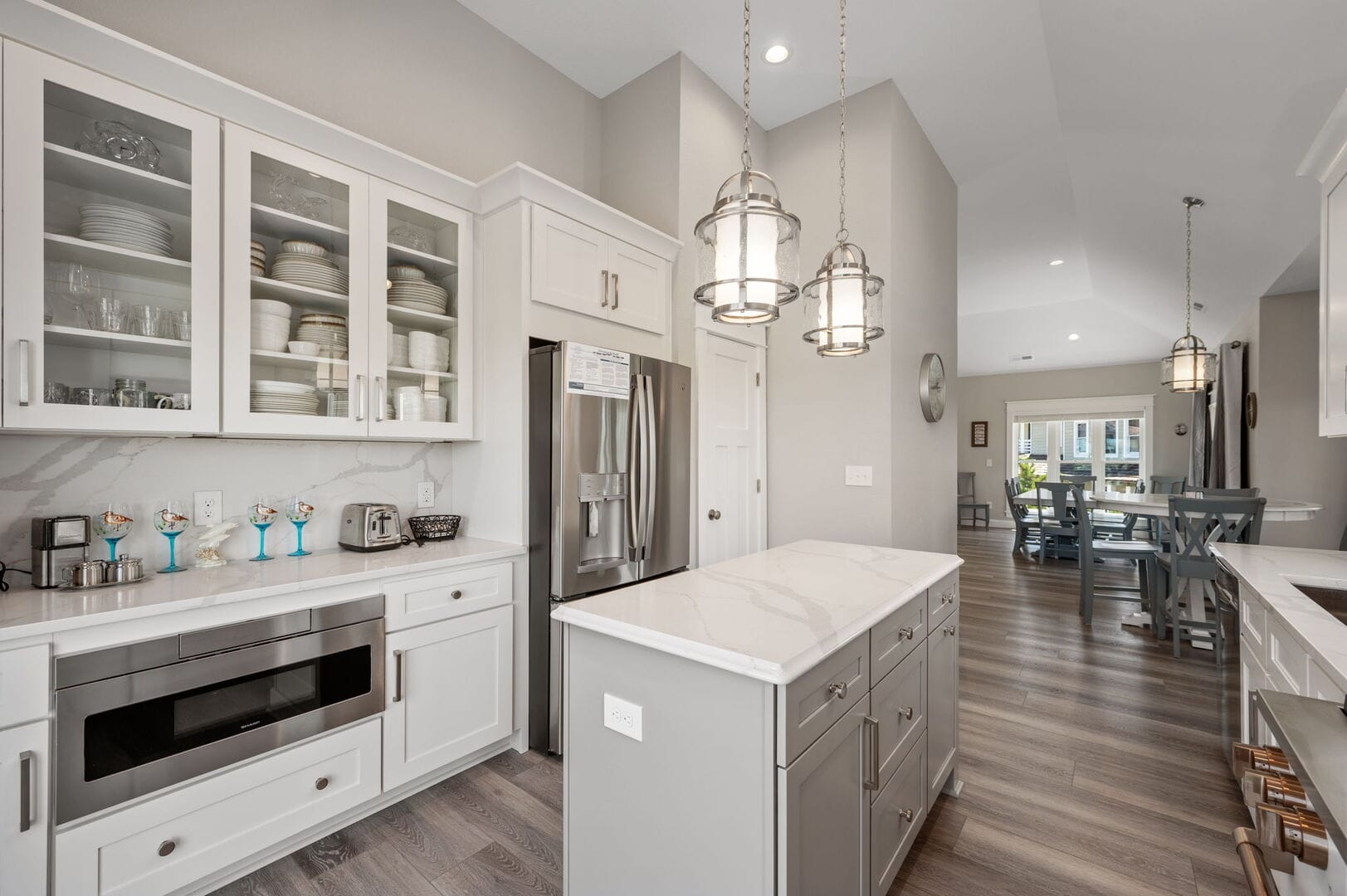 Modern kitchen with white cabinetry.