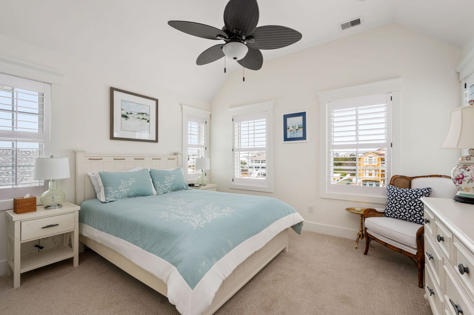 Bright bedroom with coastal decor.