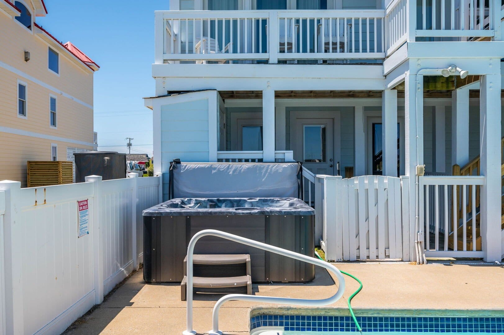 Outdoor pool and hot tub area.