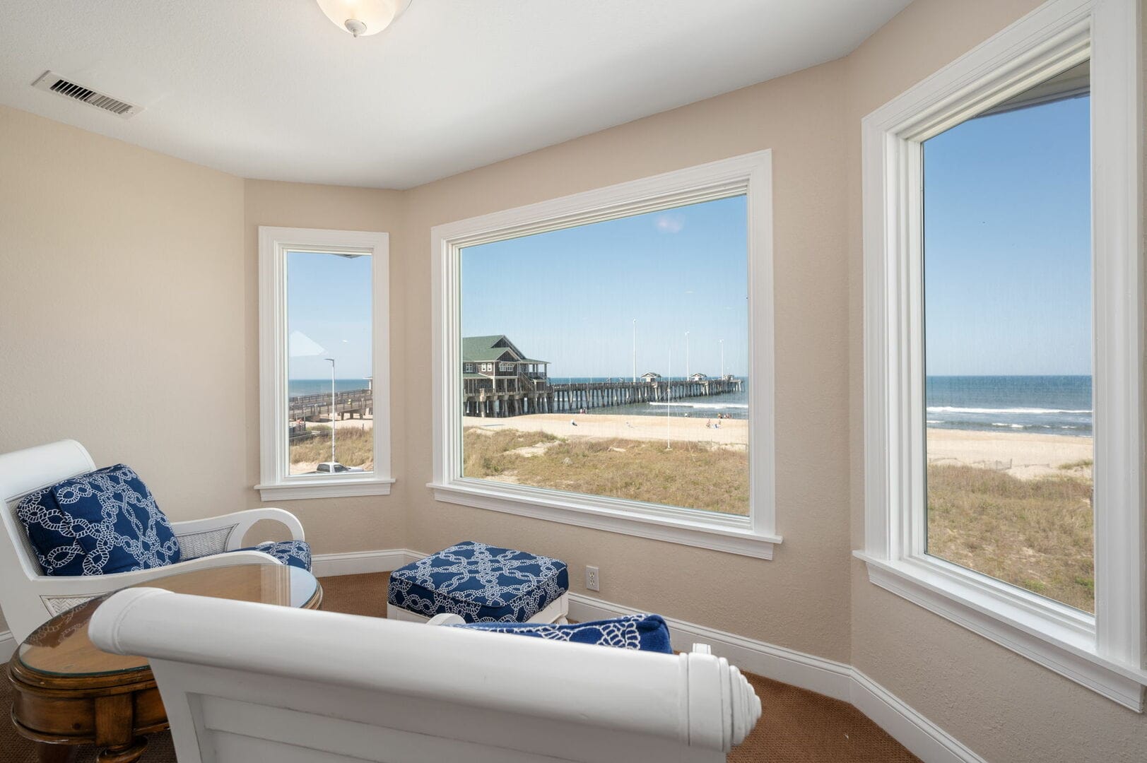 Room with ocean and pier view.