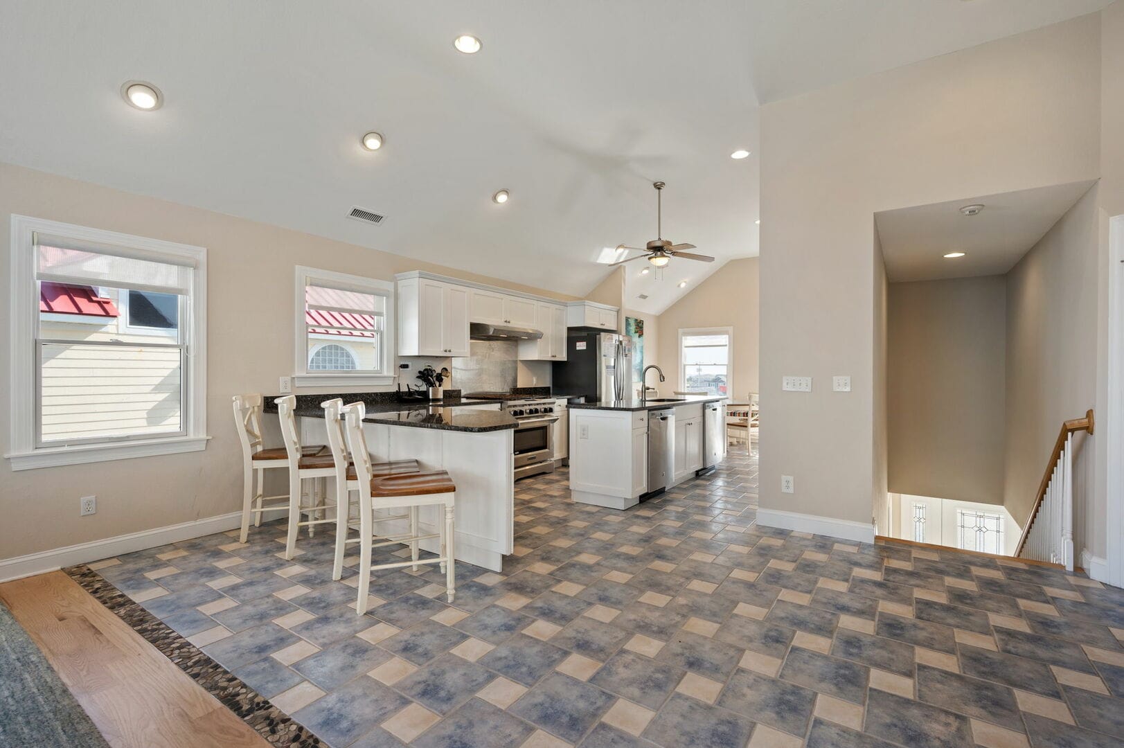 Modern kitchen with bar seating.