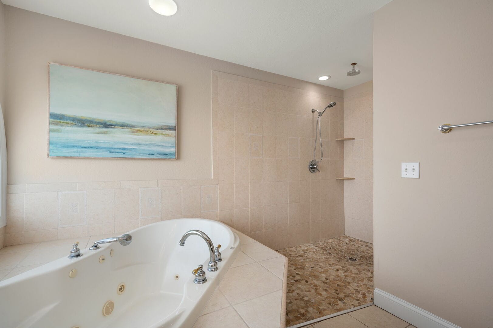 Bathroom with tub and shower.