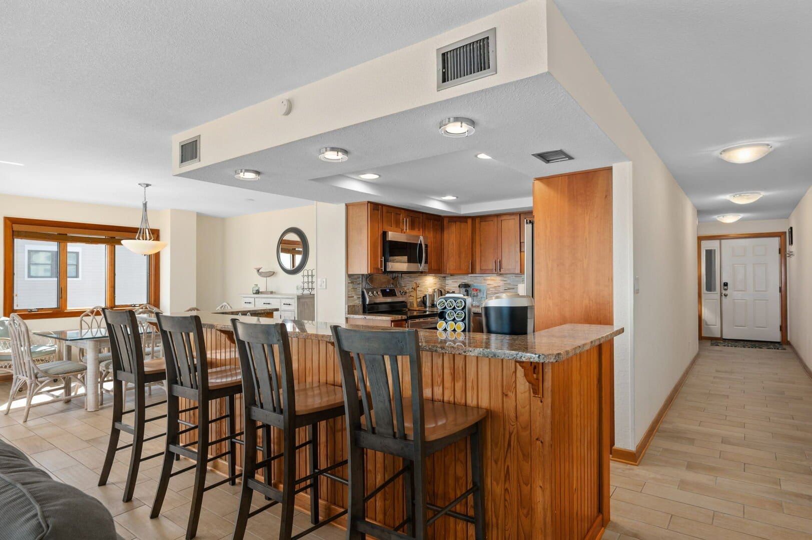 Kitchen with bar seating area.