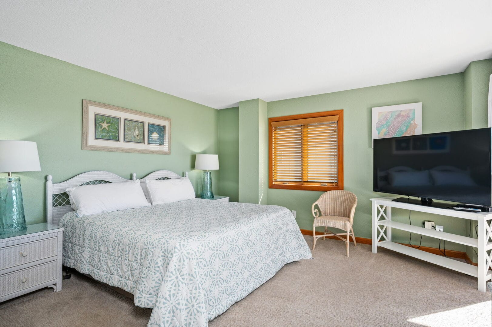 Cozy bedroom with green accents.
