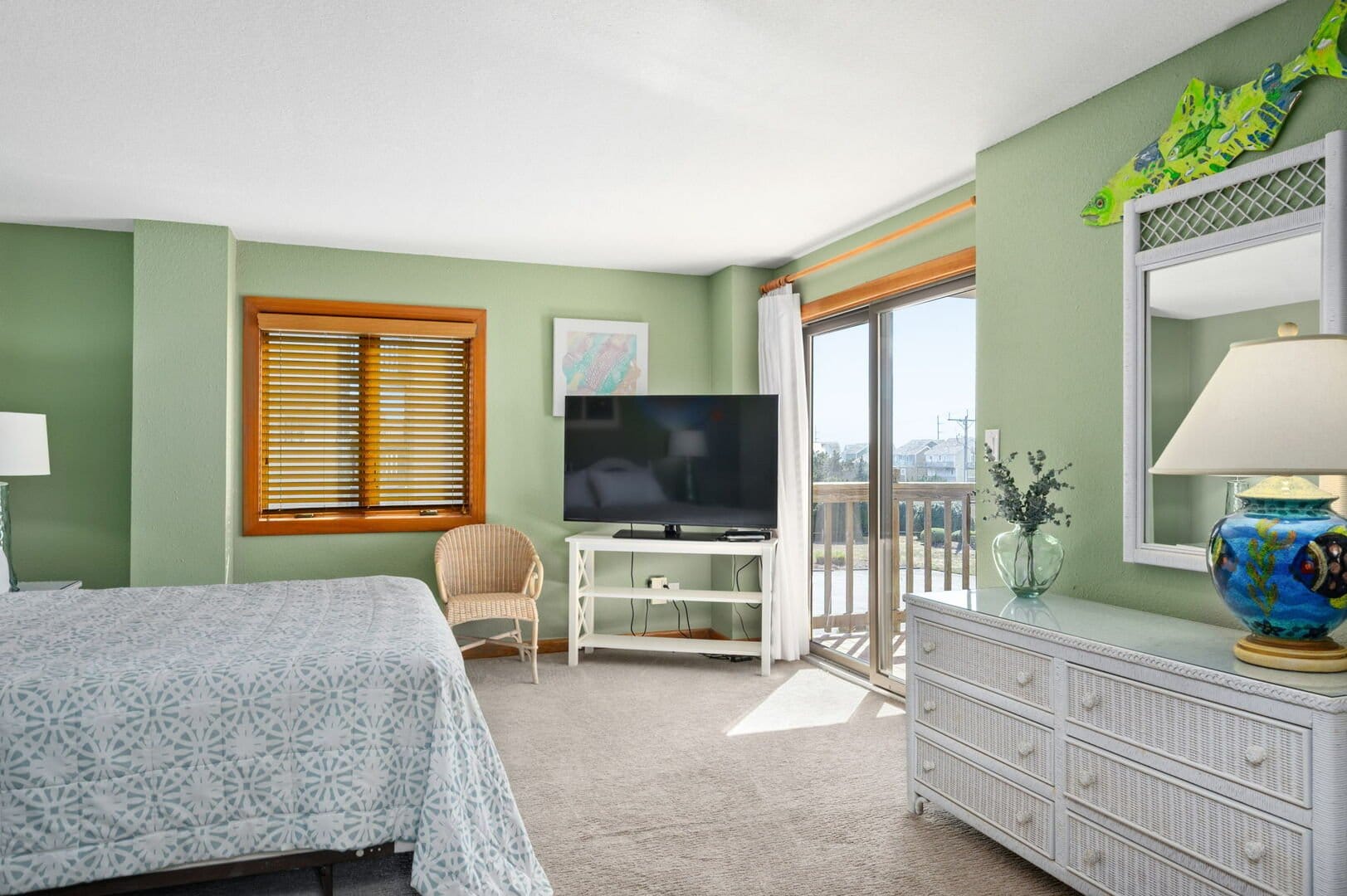 Cozy bedroom with large window.