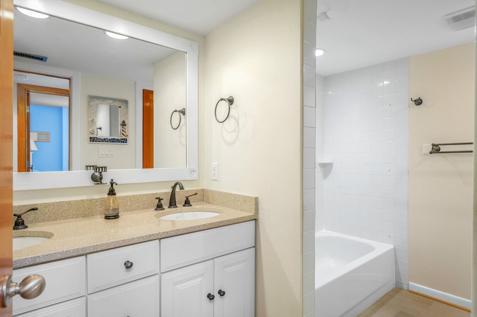 Bathroom with vanity and bathtub.