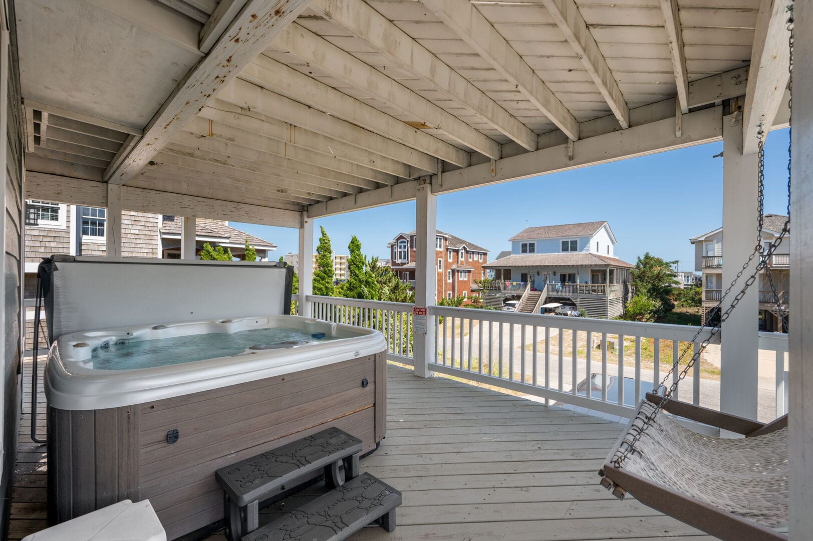 Porch with hot tub and hammock.