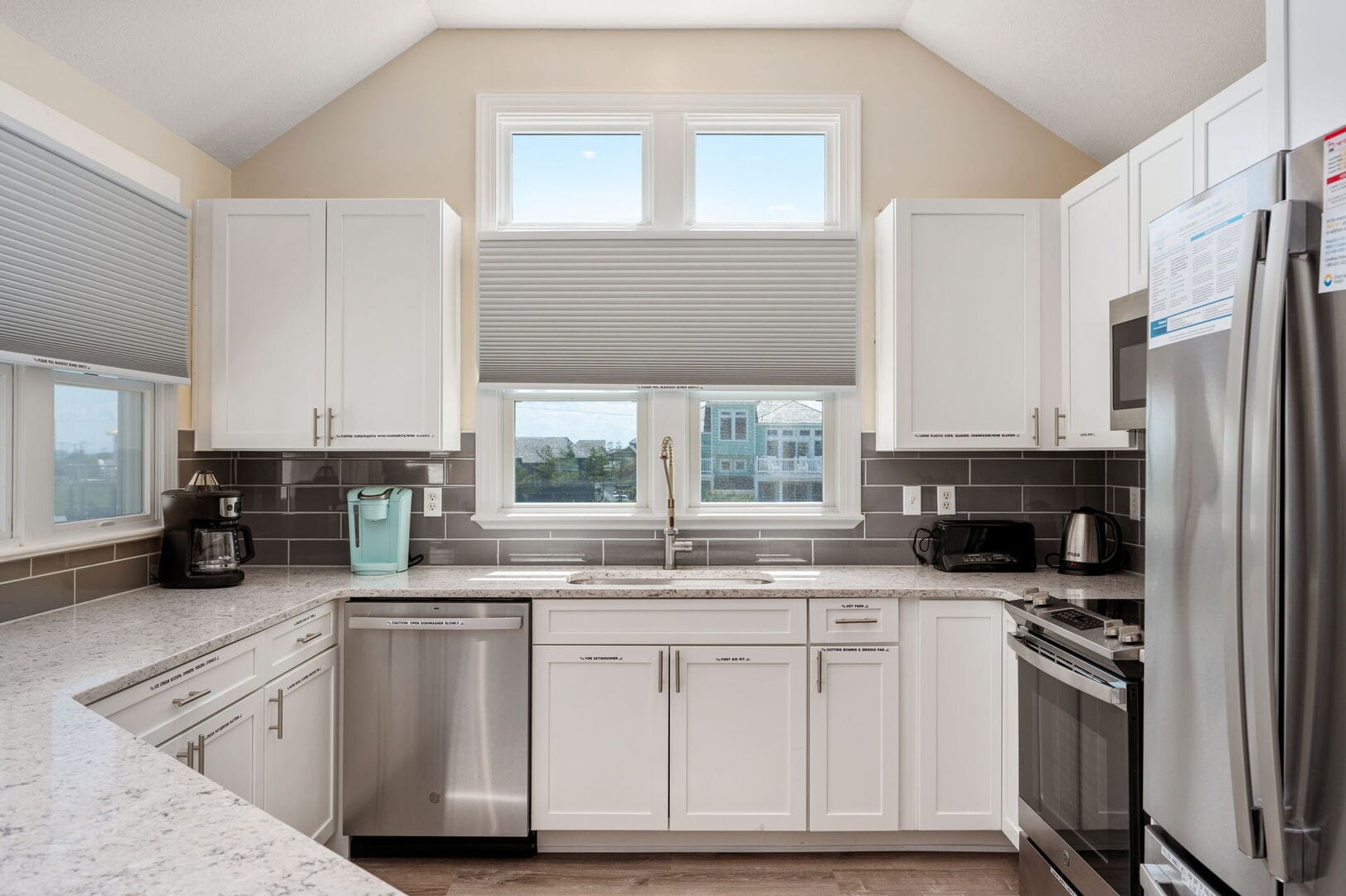 Modern kitchen with white cabinetry.