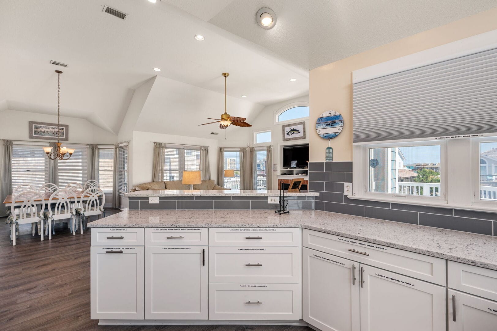 Open kitchen, dining, and living area.