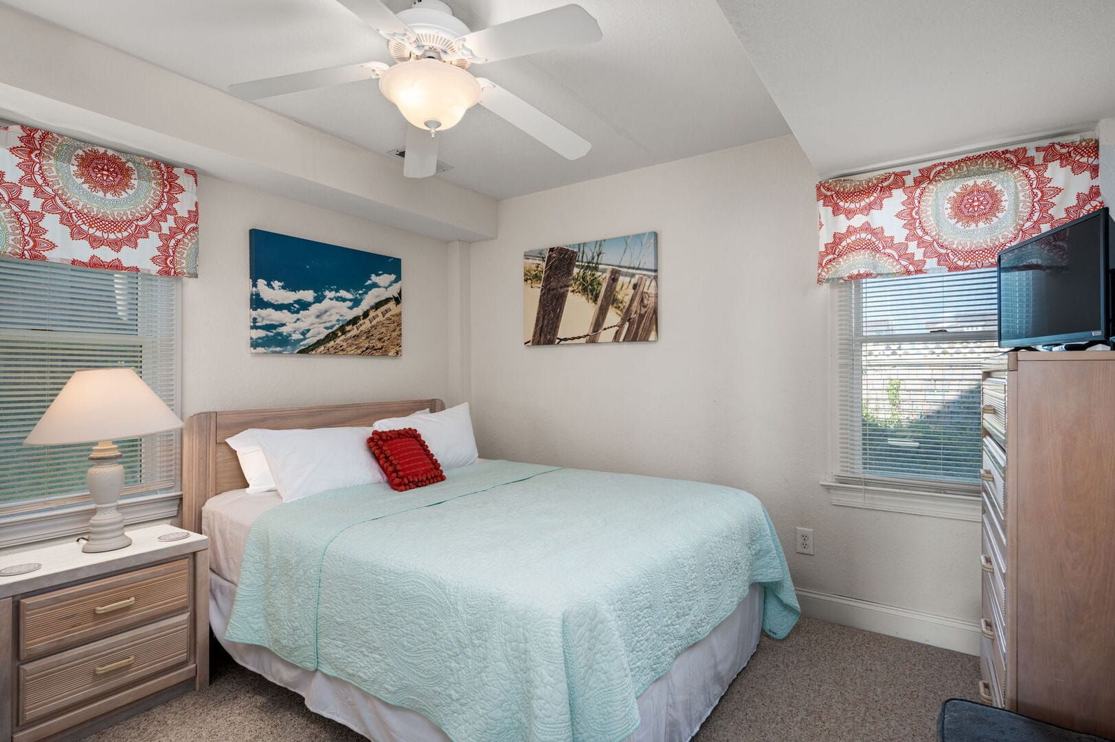 Cozy bedroom with beach decor.