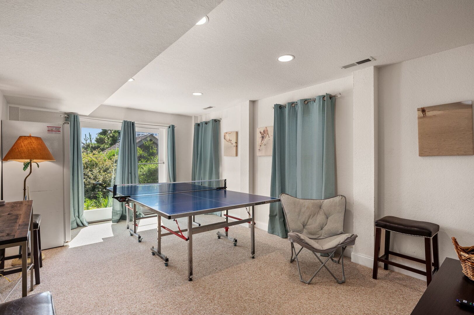 Room with a ping pong table.