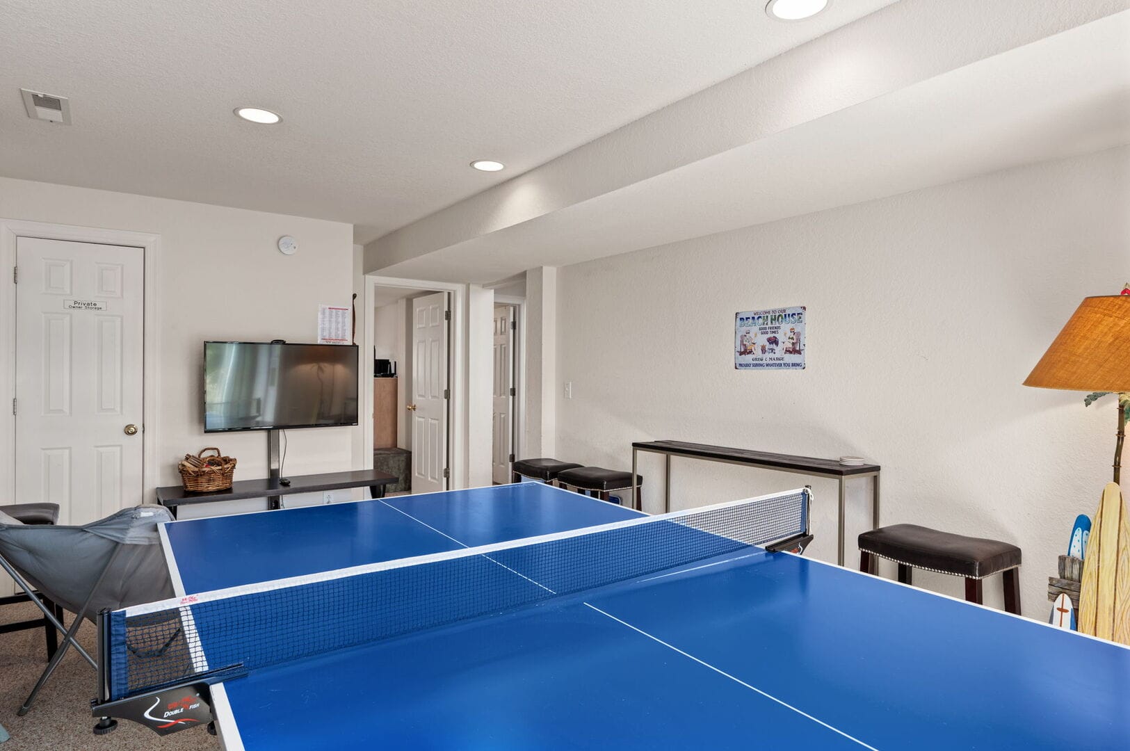 Room with ping pong table.